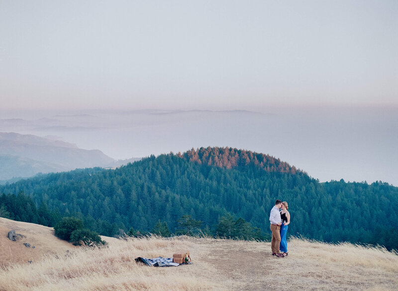 Oregon Elopement couple dancing on mountain top.
