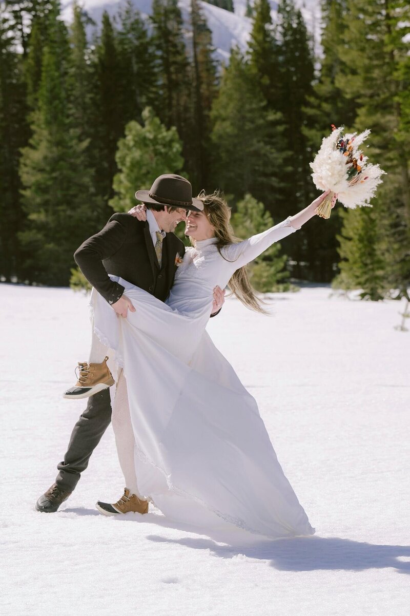 bride and groom just married during winter at Alpine Meadows in Tahoe
