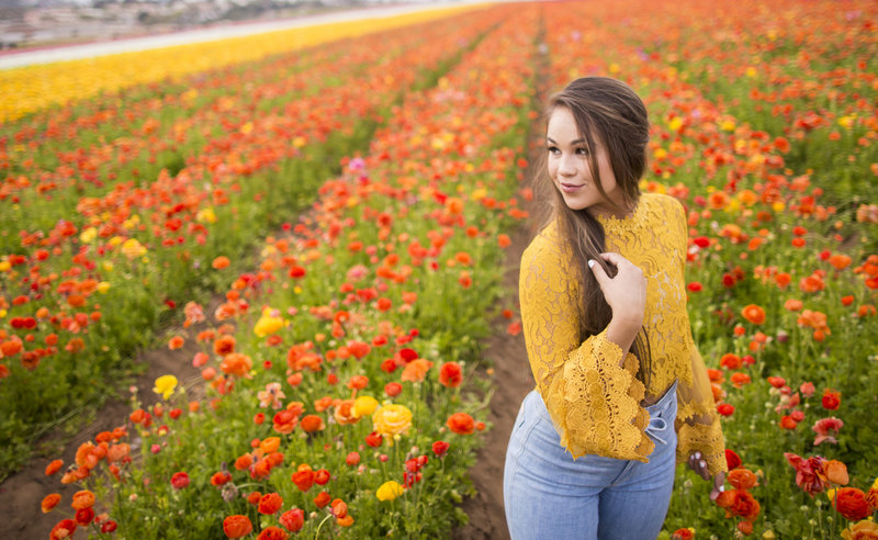 Senior Photography, senior girl standing in flower field