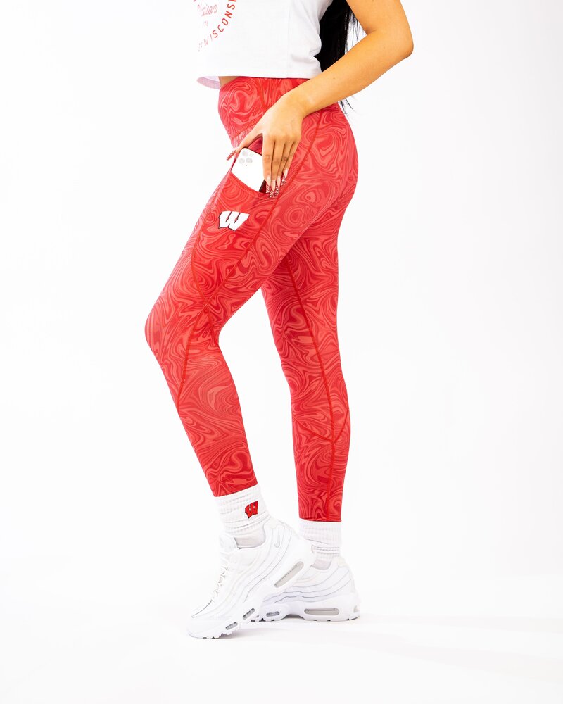 Red swirl leggings with college logo on pocket