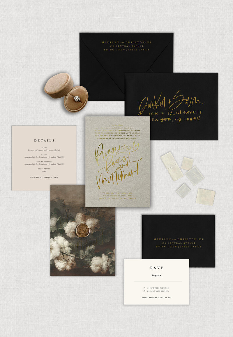 Elopement and Destination wedding invitation Gold foil letterpressed into Putty handmade paper with clean edges, suite pieces digitally printed on Mist and Snow White heavyweight cardstock, mailing envelope in Ultra Black with gold calligraphy, Ultra Black rsvp envelope and back of mailing envelope with gold foil letterpressed addresses, finished with vintage artwork printed on a vellum wrap and paired with a gold wax seal.