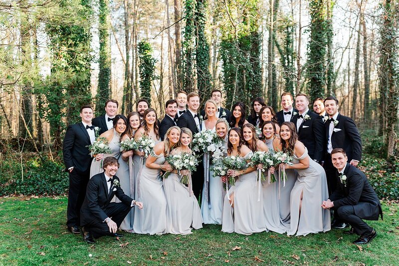 the whole wedding party standing together by Knoxville Wedding Photographer, Amanda May Photos