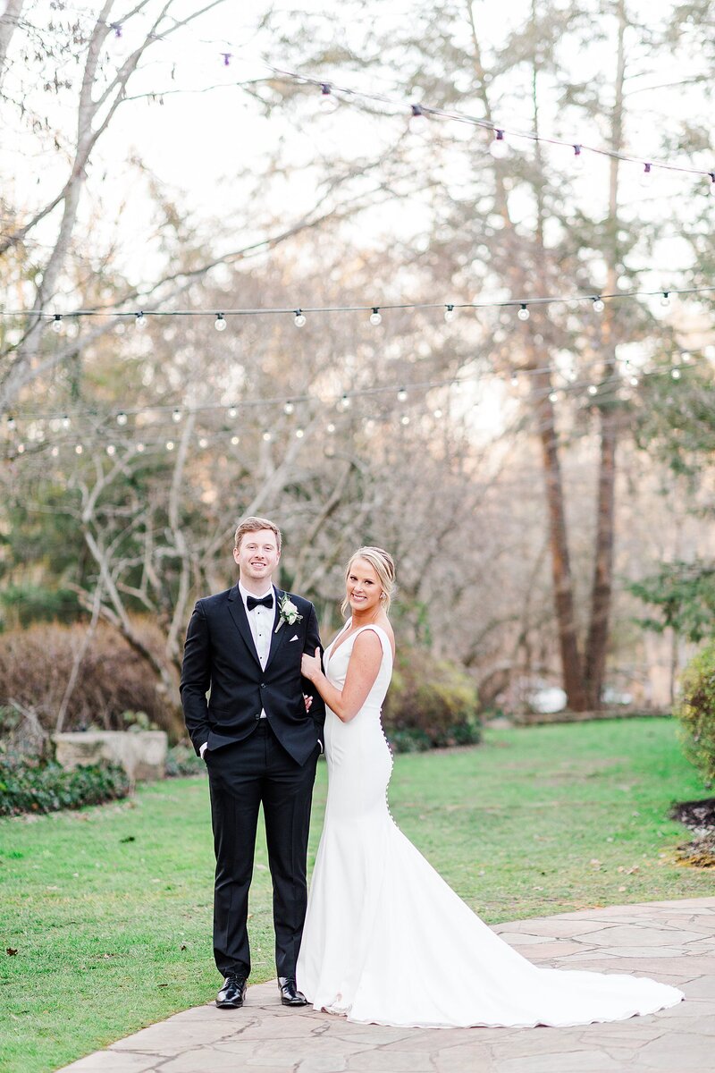 couple under twinkle lights by Knoxville Wedding Photographer, Amanda May Photos