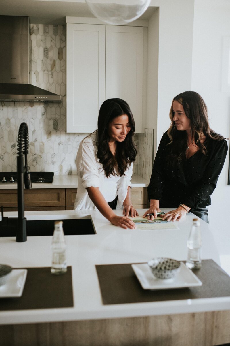 two women in the kitchen real estate