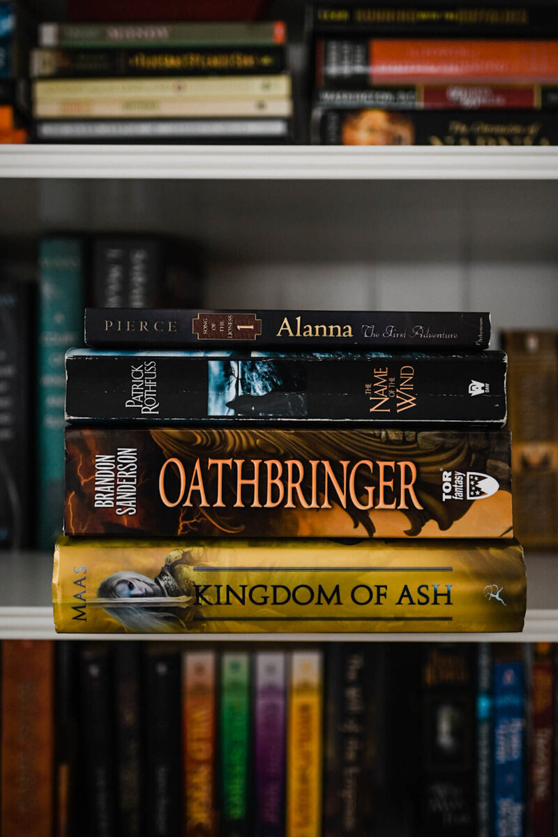 stack of books in the fantasy genre