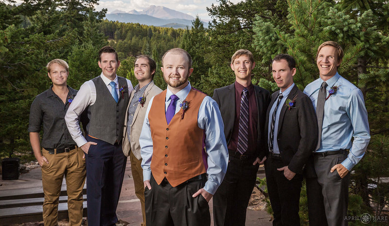 Groom with his groomsmen at the amphitheater at Colorado Mountain Ranch in Boulder CO