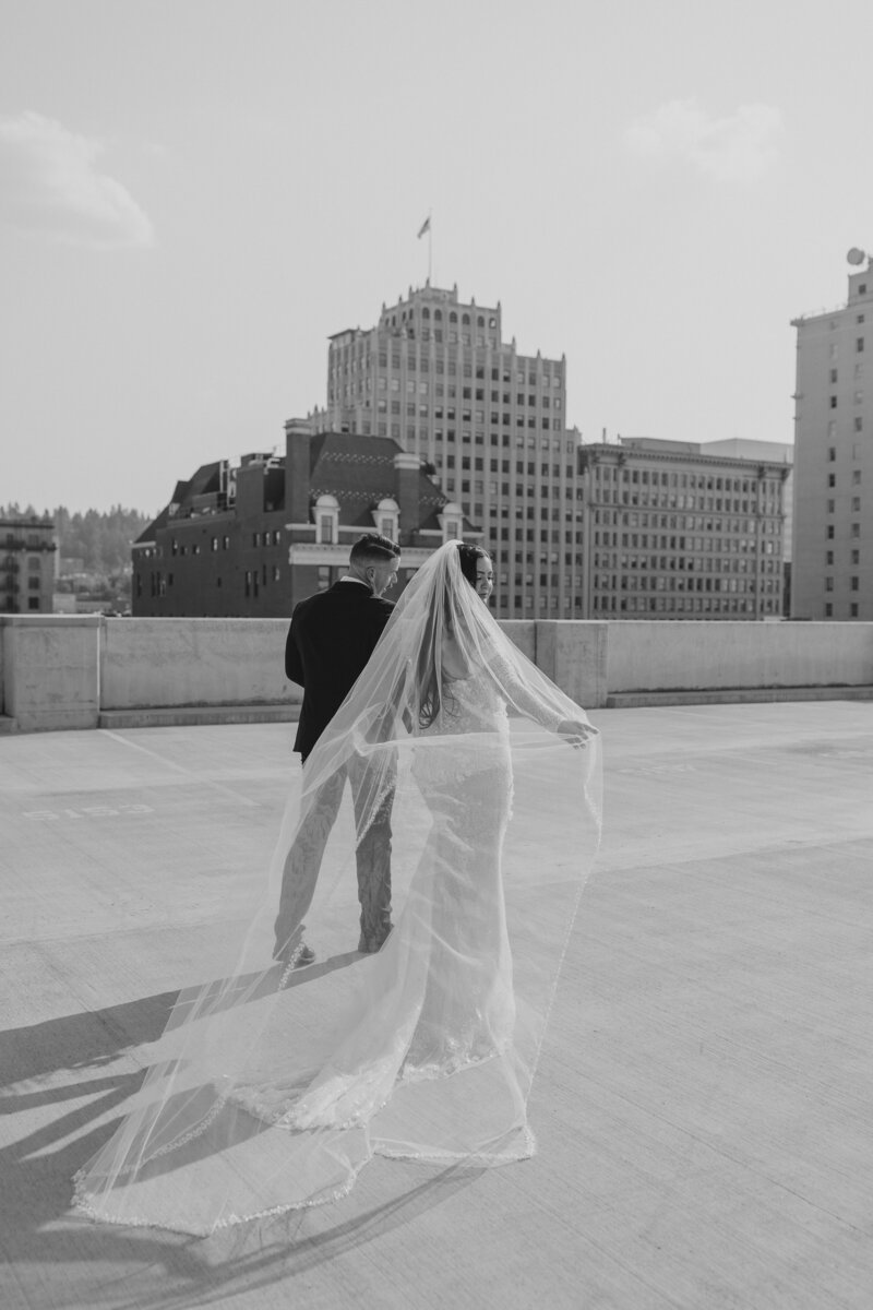 Couple Walking Together on Rooftop - Darby & Garrett | Timbers on Pacific Wedding Spokane Washington