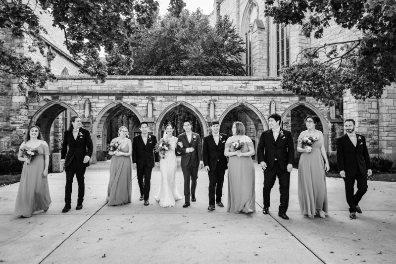 Wedding party walks together at Northwestern University