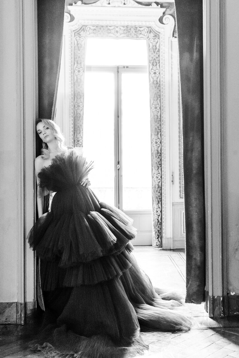 Black and white photograph of a bride in her pre-wedding portraits at Villa Erba on Lake Como in Italy photographed by Italy Wedding photographer