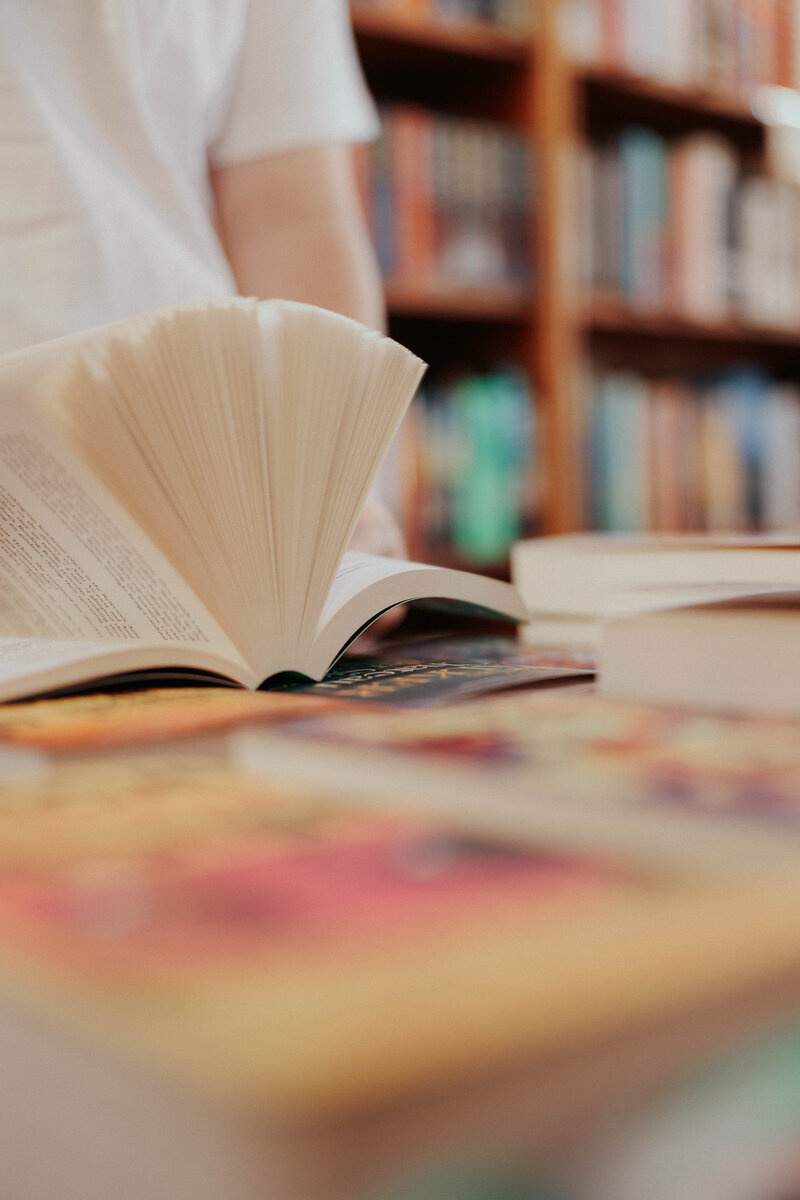 Jessie flips a book