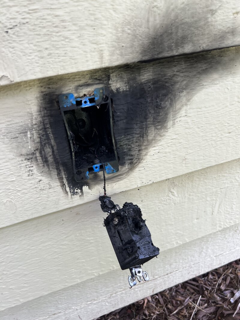 Burned outlet caused by a faulty wiring. Replaced and fixed by Evergreen electric