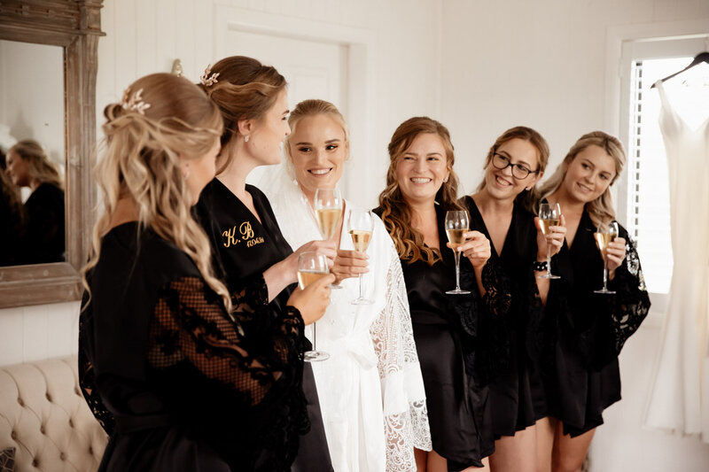 Bridal gowns and champagne at bridal prep