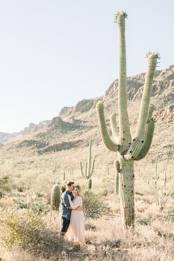 Tucson Desert Engagement Session Photo of Couple Next to Saguaro Cactus at Gates Pass | Tucson Wedding Photographer | West End Photography