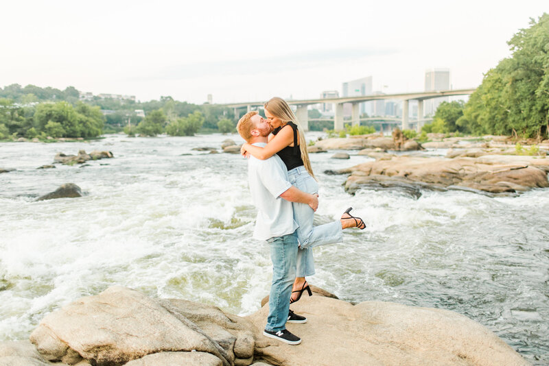 Couple kissing in a river