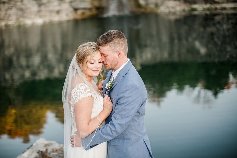 couple standing by water by Knoxville Wedding Photographer, Amanda May Photos
