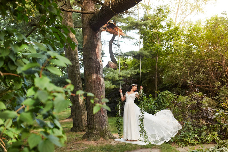 bride on swing from tree