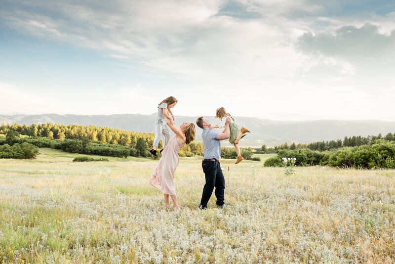 Ann Arbor Newborn Photographer captures lifestyle family session in Castle Rock Colorado with Mountain Views