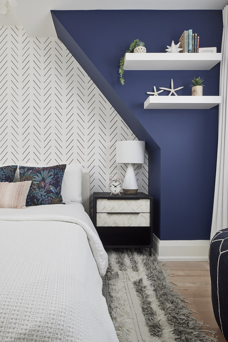 Blue modern bedroom with accent wall wallpaper
