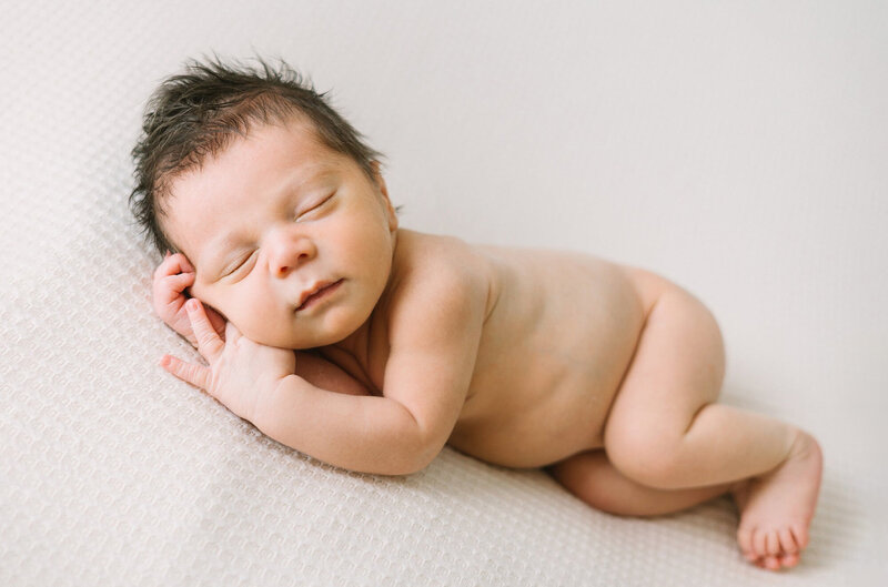 A newborn baby boy sleeeping duirng his Los Angeles newborn session with Daniele Rose Photography