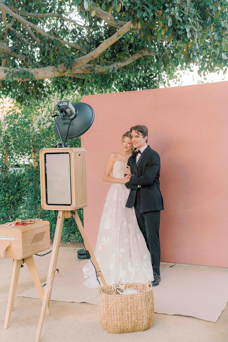 San Diego wedding couple at photo booth