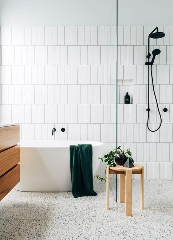 Vertical White Subway Tile Bathroom