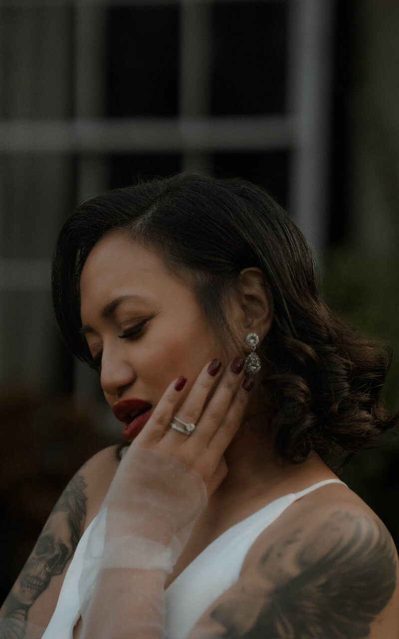 Bride in profile, exuding elegance and grace, captured in a stunning moment that highlights her bridal beauty and timeless style
