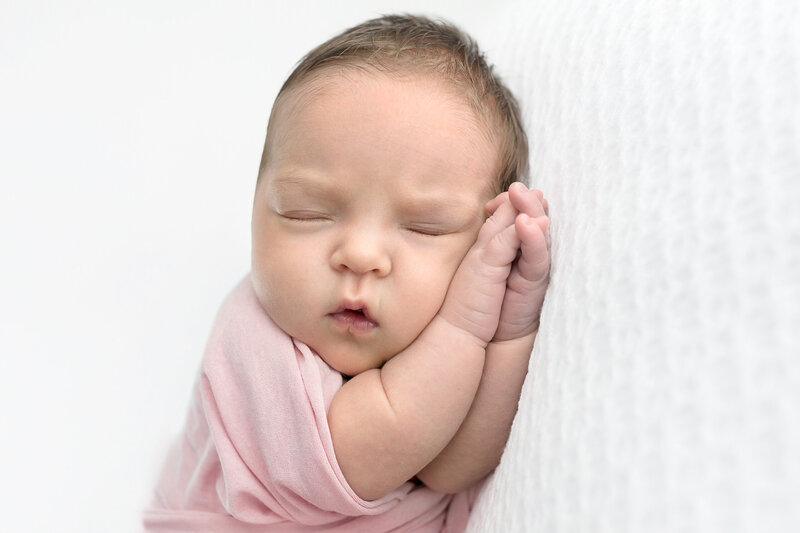 Karen Kahn of Looking Up Photography sweet sleeping newborn baby girl