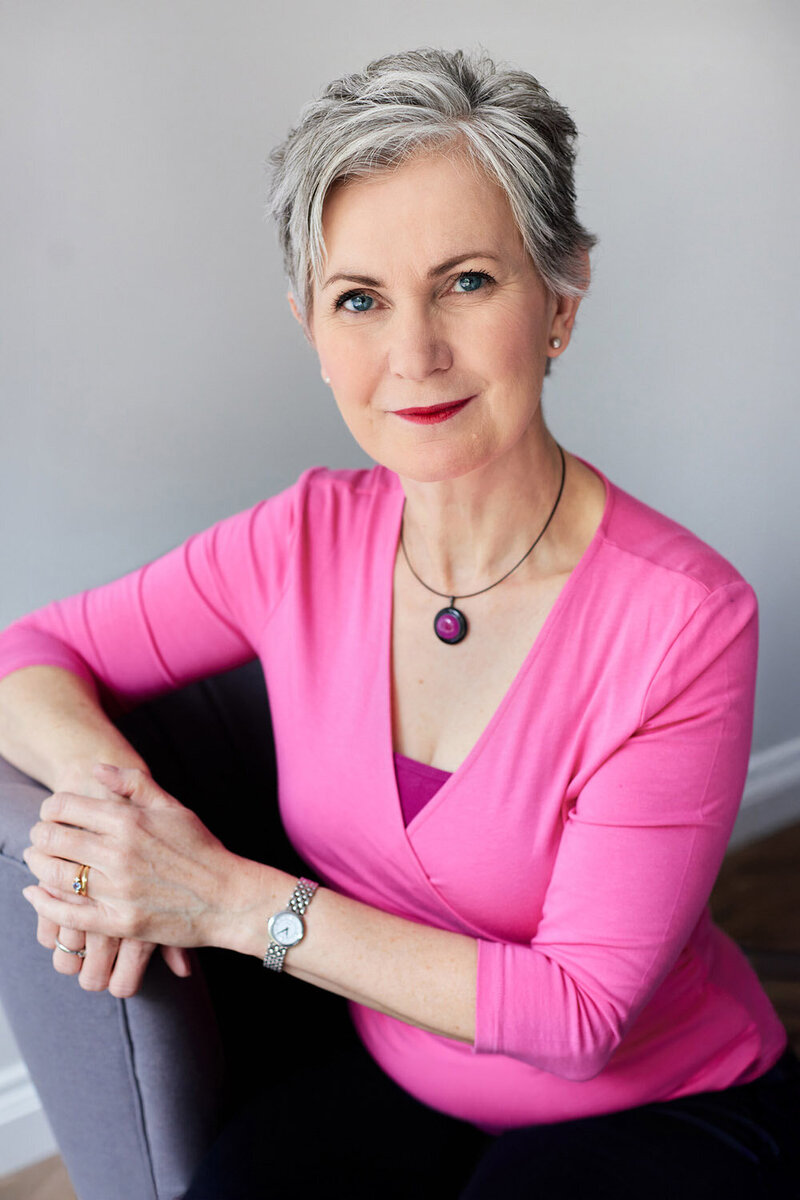 Lucy Barrett's portrait in a pink coat