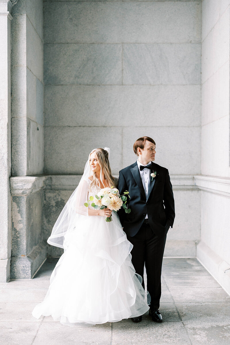 Bride and groom pose for portraits inside the PA State Capitol Building in Harrisburg