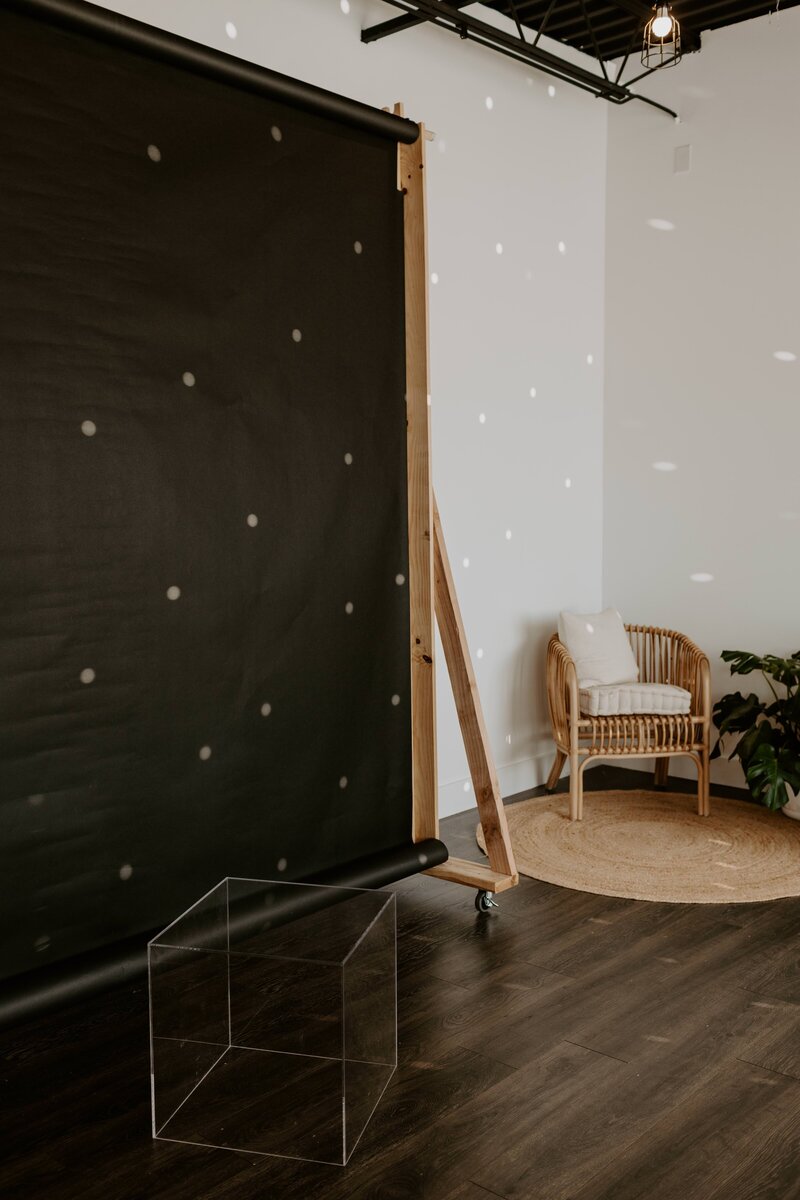 photo studio with black backdrop