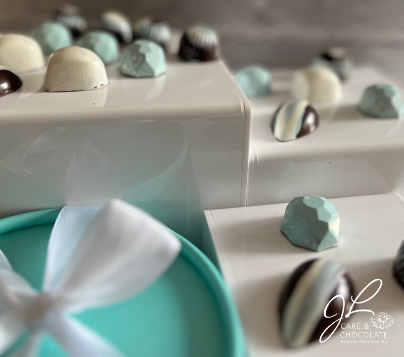 hand-painted luxury chocolate bonbons in tiffany blue