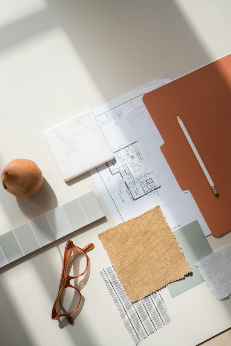 Interior design concept board with fabric, tile and colour samples | new build project planning