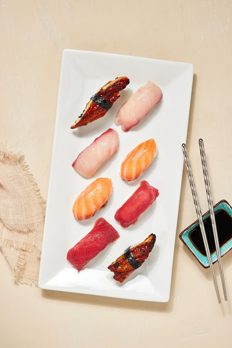 Various sushi on a white plate