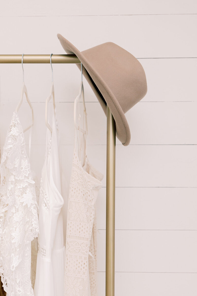 Hat hanging on clothes rack