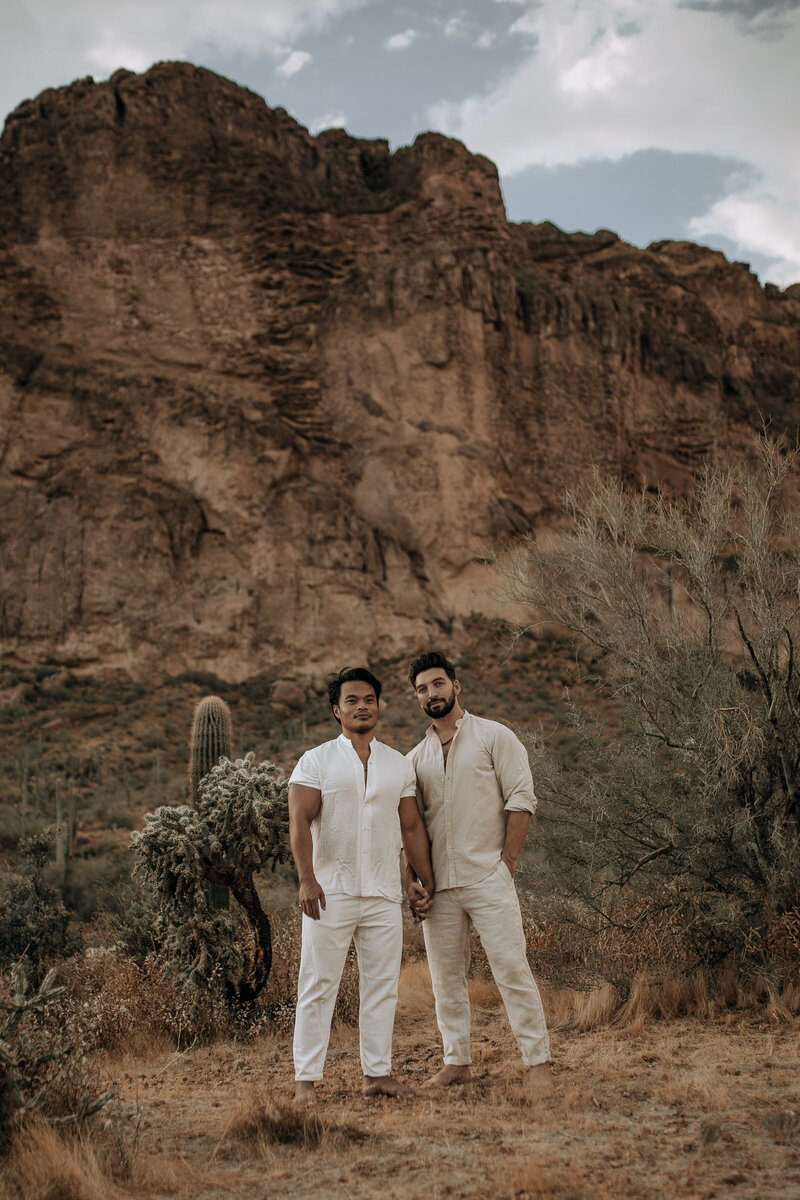 white linen engagement session outfit in desert of arizona