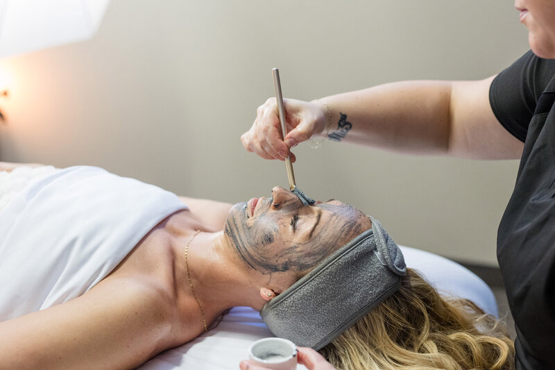 Client receiving a facial