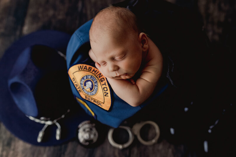 newborn baby boy in WA STATE PATROL uniform