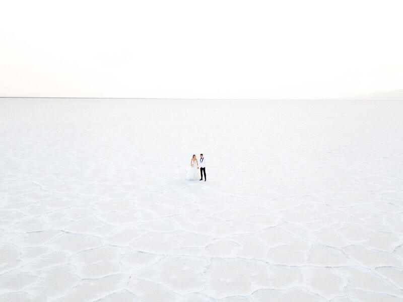Olympic Athlete Chari Hawkins and her husband CJ on the Salt Flats, Drone shot by Cali Warner Media