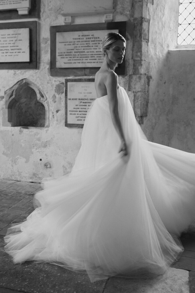 Modern flowing long wedding dress on soft corset by British bridal designer Luna Bea