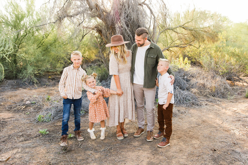 family smiling together in Phoenix photo session