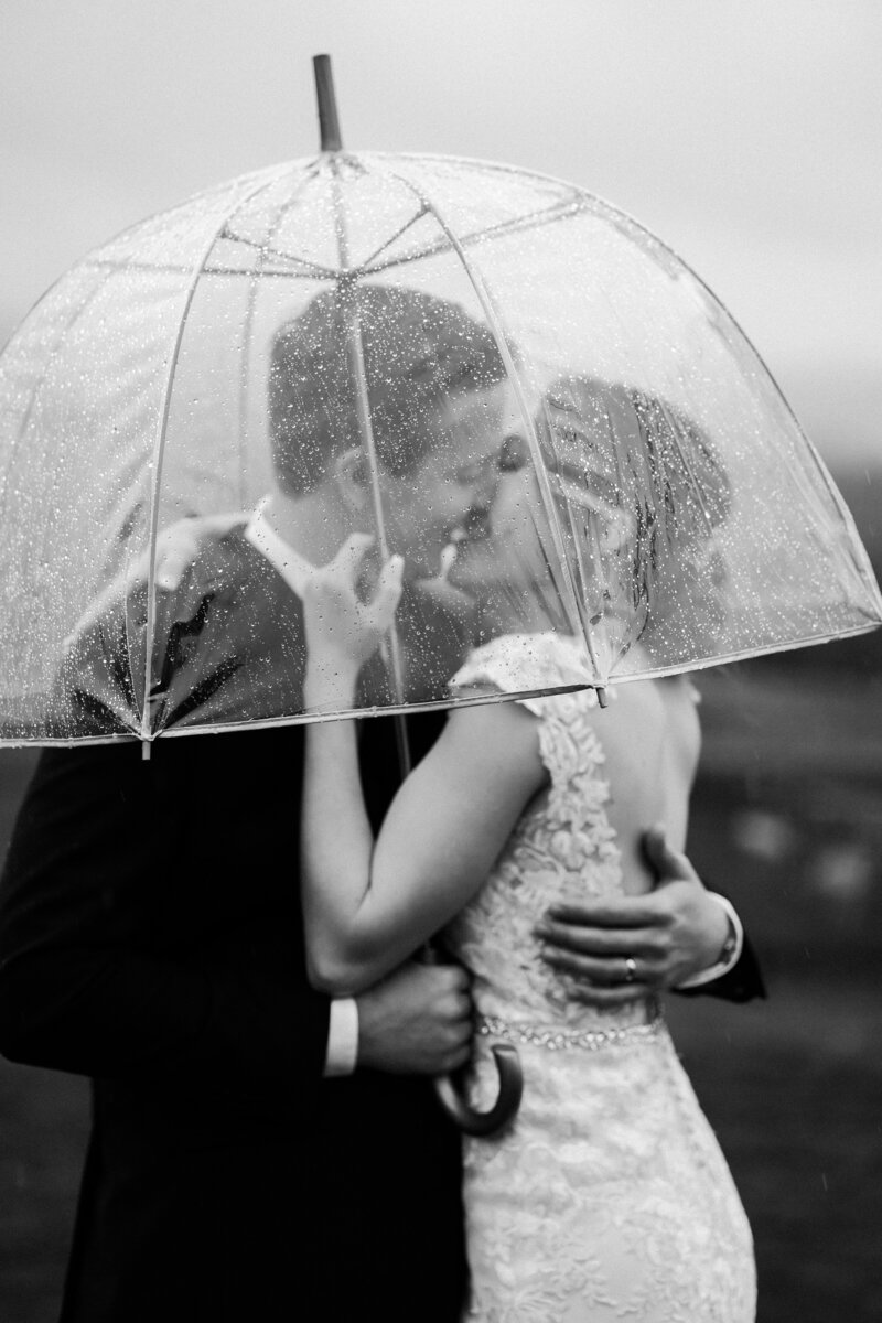 Wedding in the rain black and white