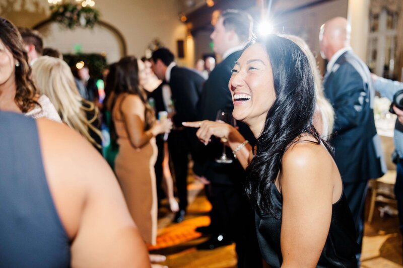 Guests partying at reception by knoxville wedding photographer