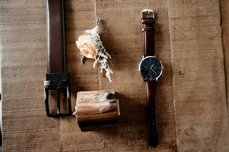 Groom 's watch, belt and boutonniere