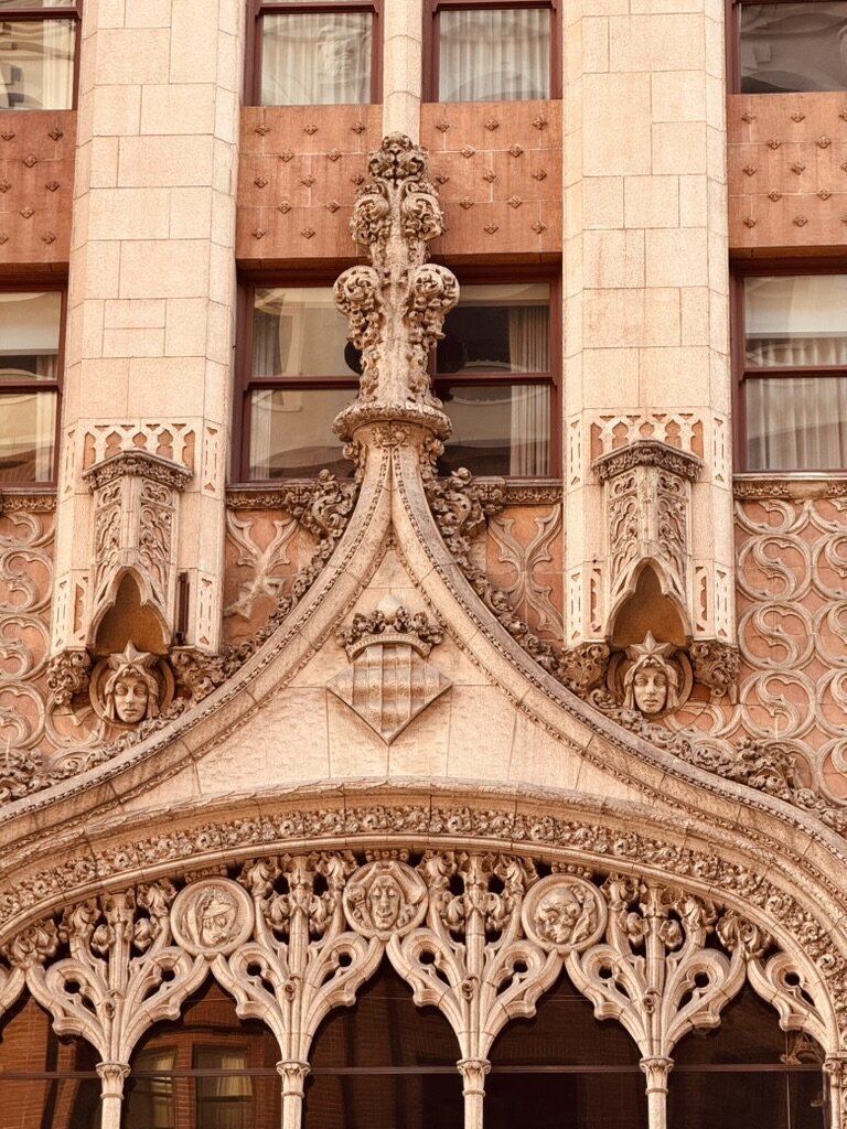 Ornate gothic-style stone facade in downtown Los Angeles, used as background image on Jasmina Kimova’s contact page to reflect cinematic legacy and elegance.