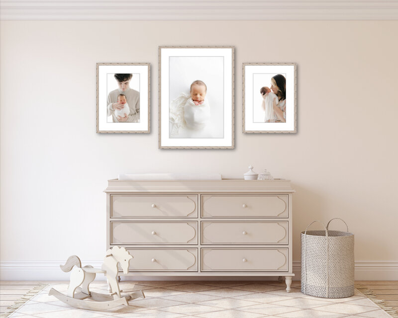framed portraits of newborn baby hanging over a changing table, Indianapolis newborn photography