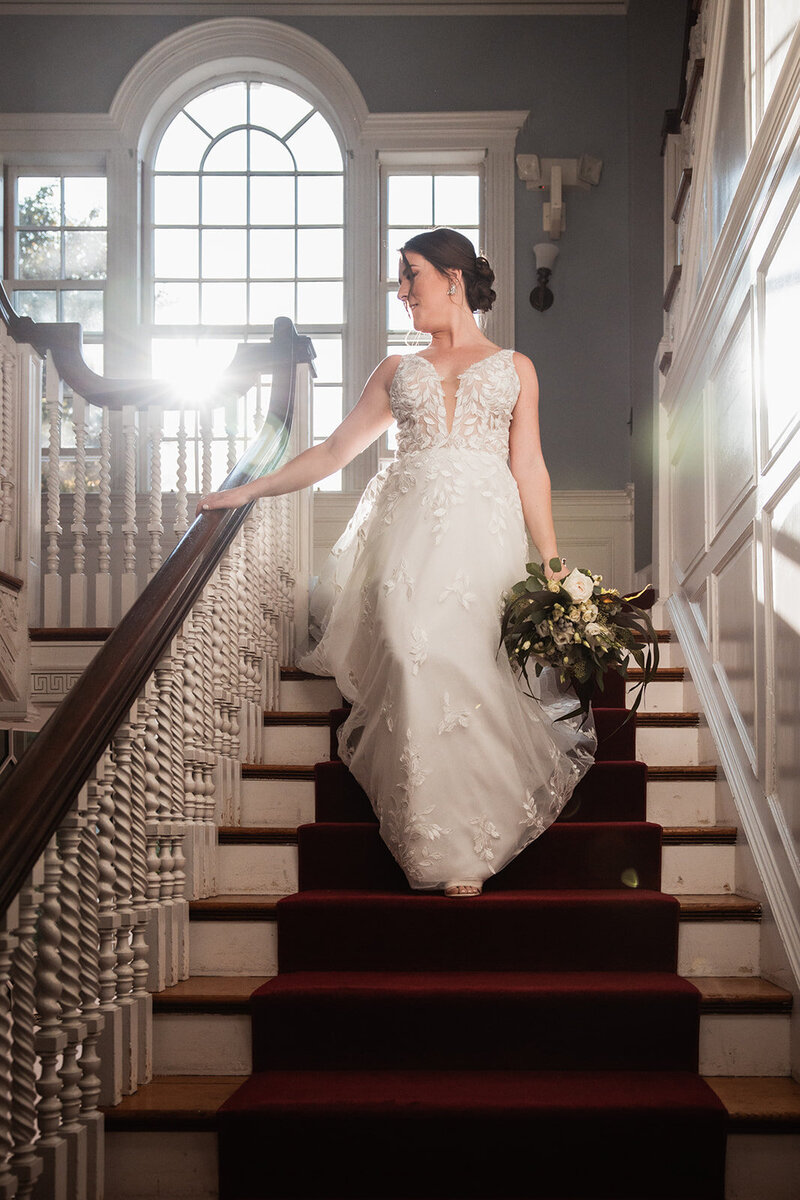 Bride Walking Down Stairs towards Ceremony