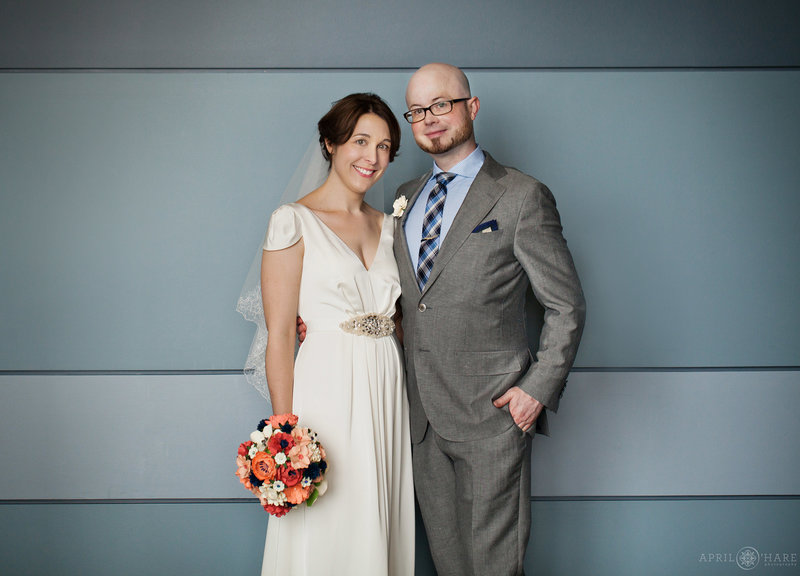 Cute inidie couple on their wedding day indoors in Denver