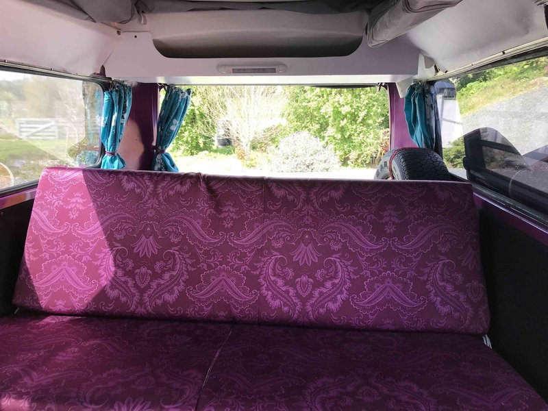 Inside view of seating of Pippi, purple retro kombi van from NZ Kombi Hire