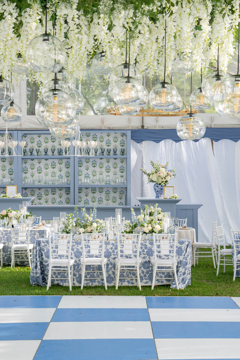 luxury outdoor texted wedding with hanging chandeliers