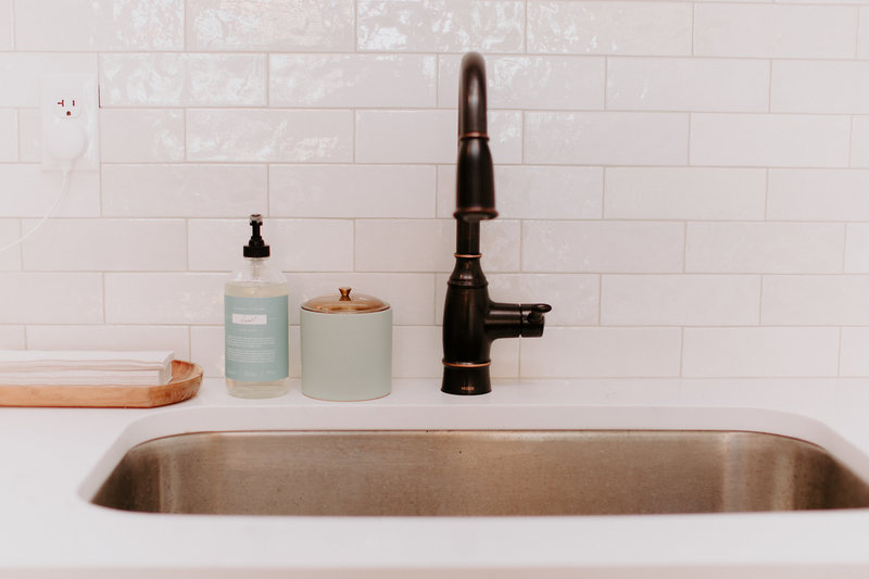 Our kitchenette space details including our sink, handsoap, and handtowels
